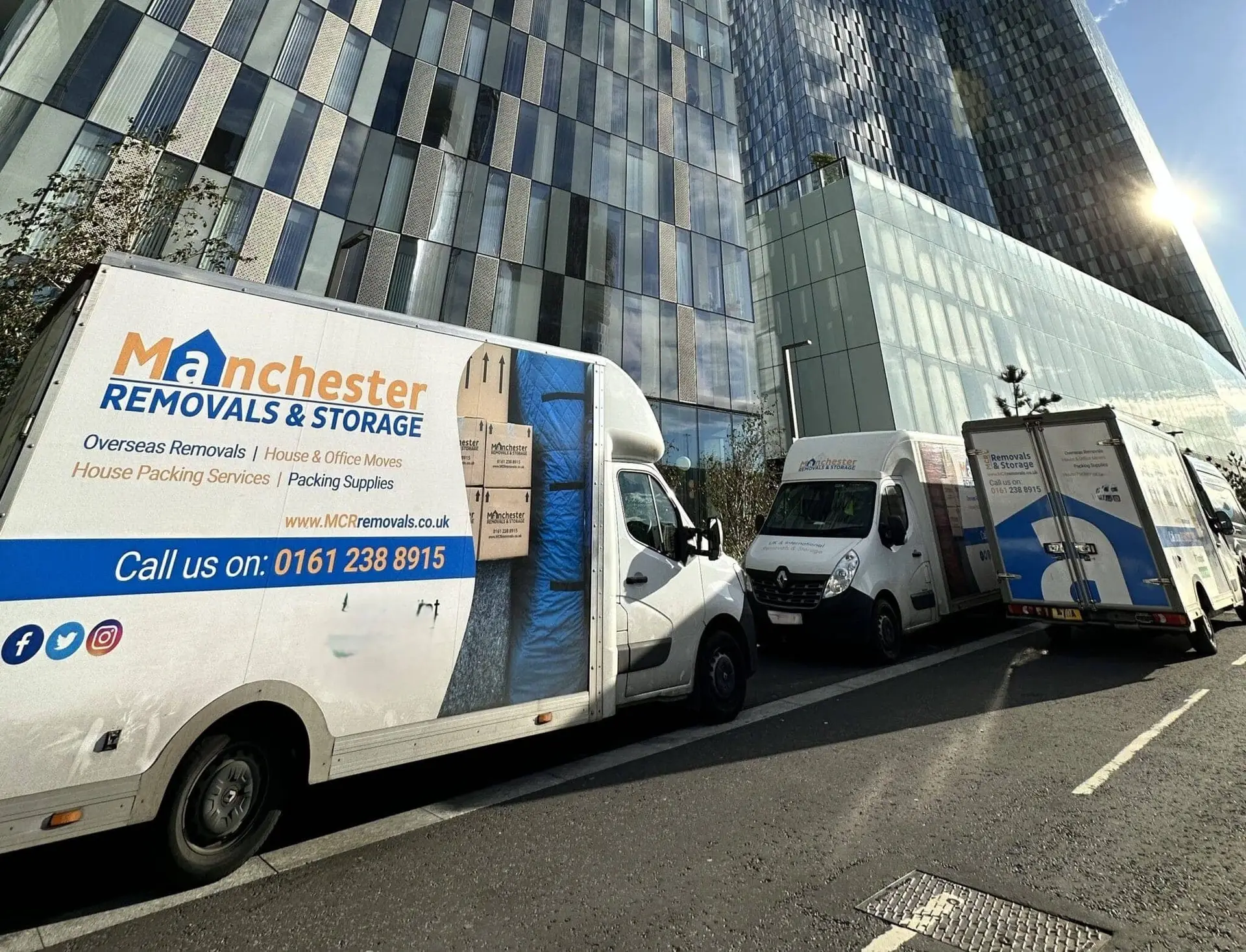 MCR Removals van outside Deansgate tower